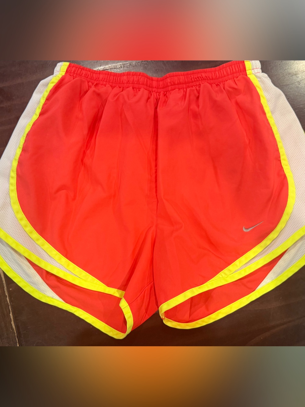 Nike Women’s Red Athletic Shorts with Yellow Trim